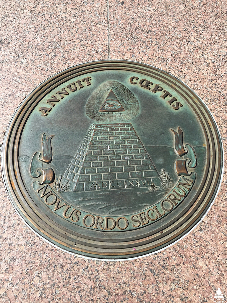The reverse side of the seal includes an unfinished pyramid with the Roman numerals for 1776 at its base, as seen on a plaque in Freedom Plaza.